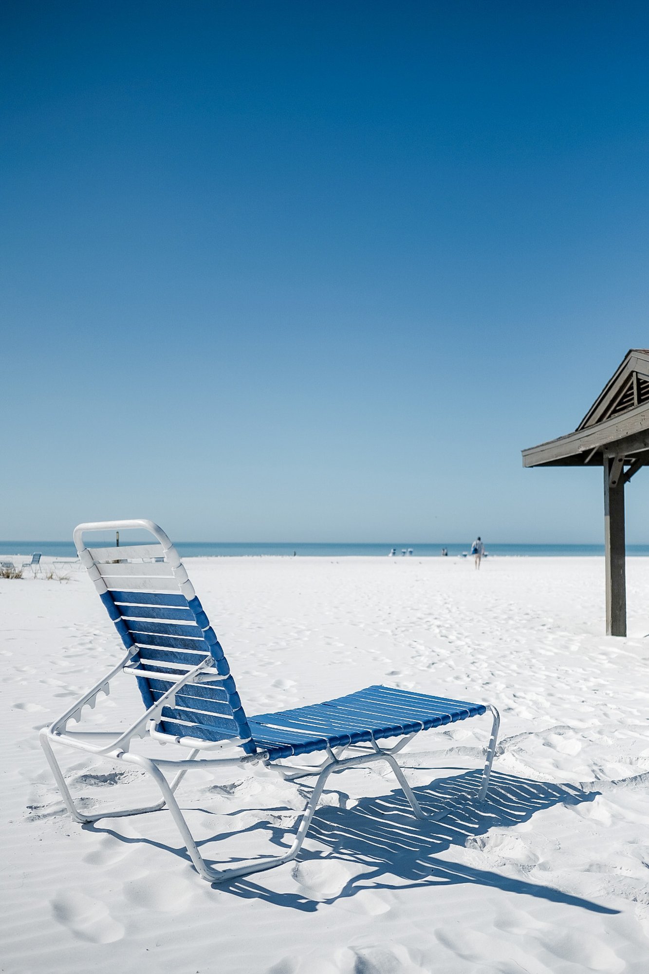 Blue lounge chair on Crescent Beach
